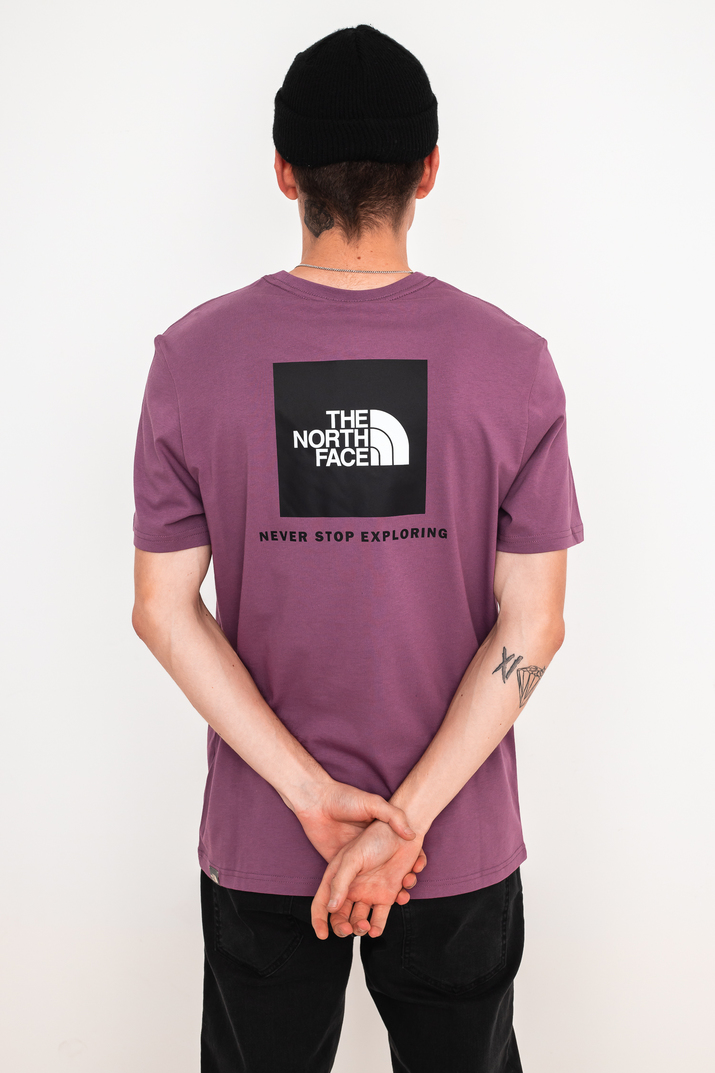 purple north face shirt